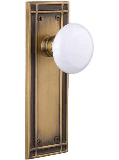 Mission Door Set with White Porcelain Knobs in Antique Brass.